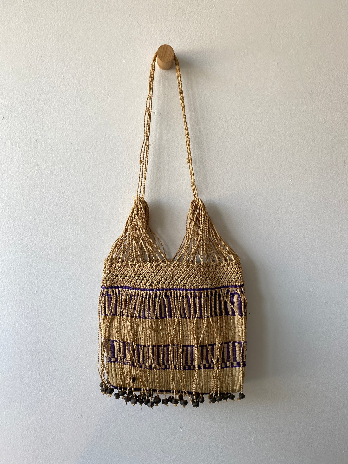 Straw bag with dangling beads