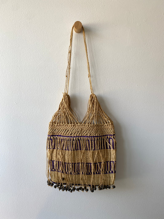 Straw bag with dangling beads