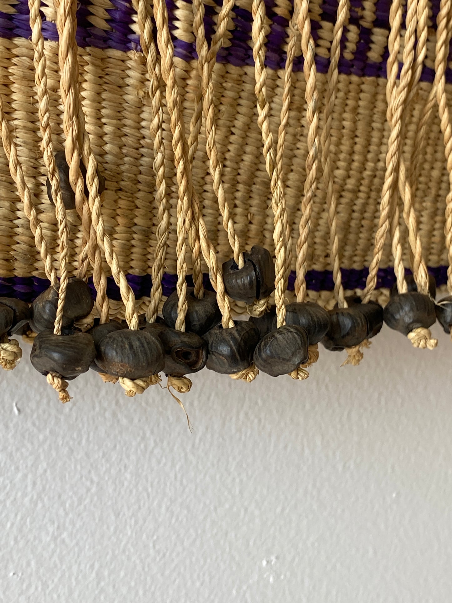 Straw bag with dangling beads