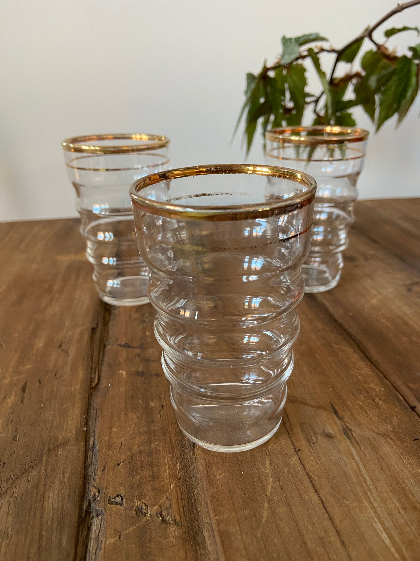 Set of 9 gold rimmed glassware