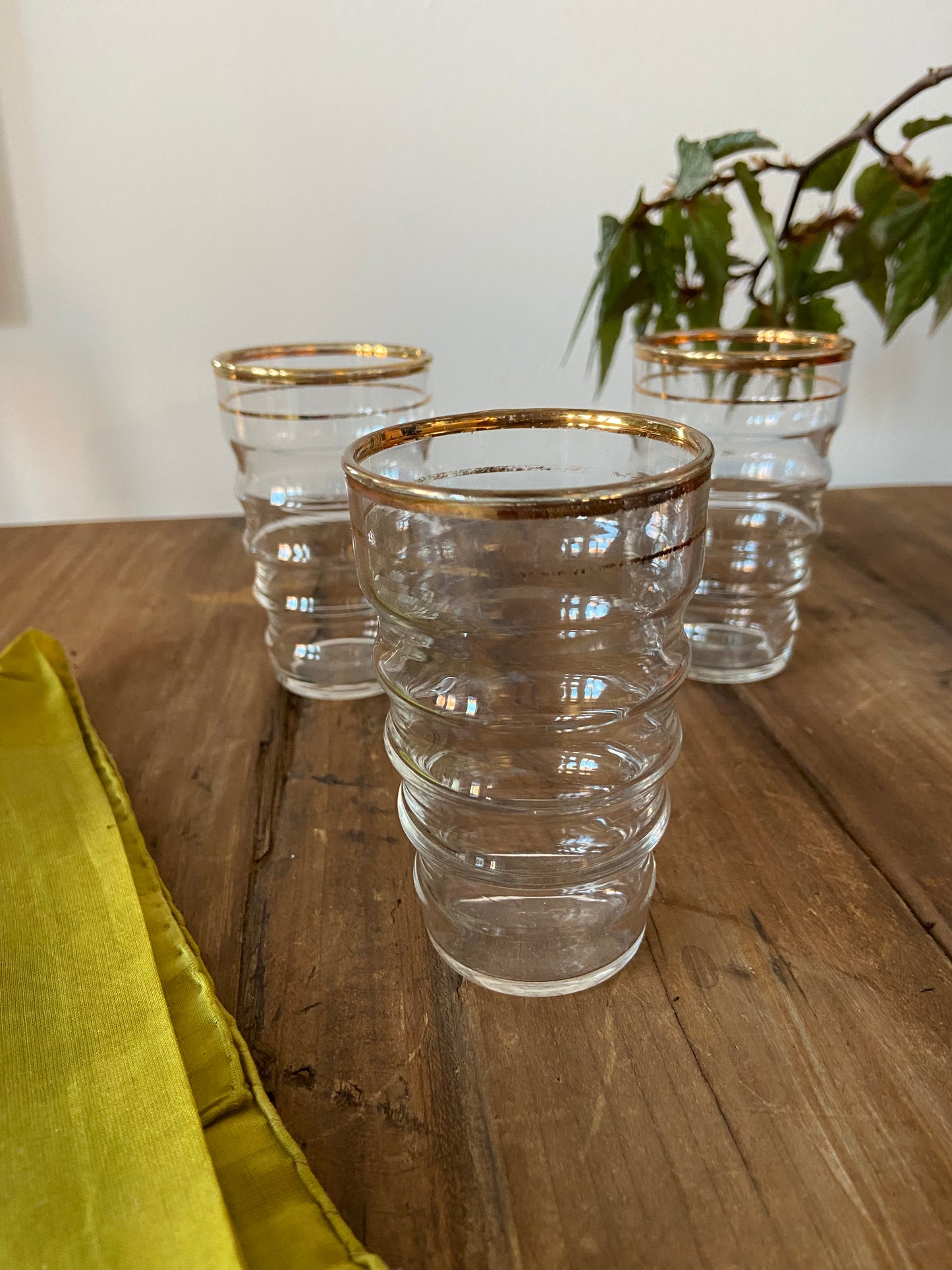 Set of 9 gold rimmed glassware