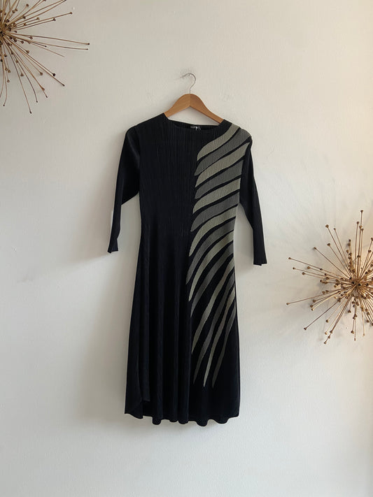 Black pleated dress with green and grey accents SS 1-2