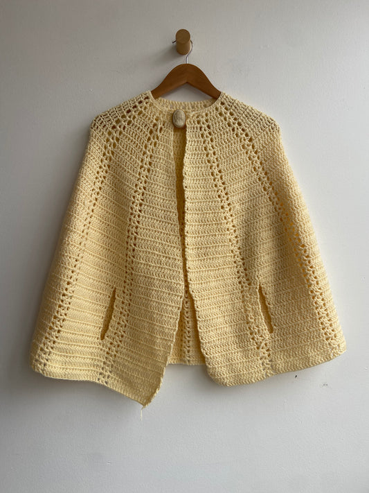 Hand-knit cream capelet with broach SS 1-3