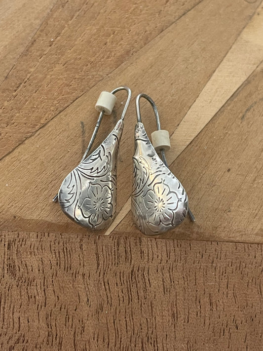 Drop-shaped dangles
