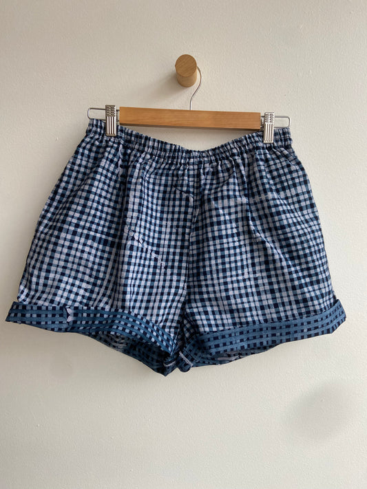 Marked down from $100: Fahari Bazaar Sudi blue checked shorts SS 1-3